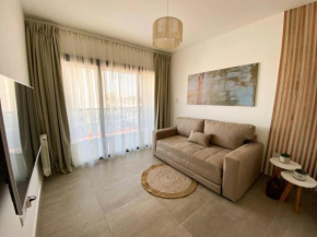 Moderno departamento con pileta para vacacionar